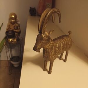 A rare antique vintage and stunning 110-year-old copper gazelle statue. 